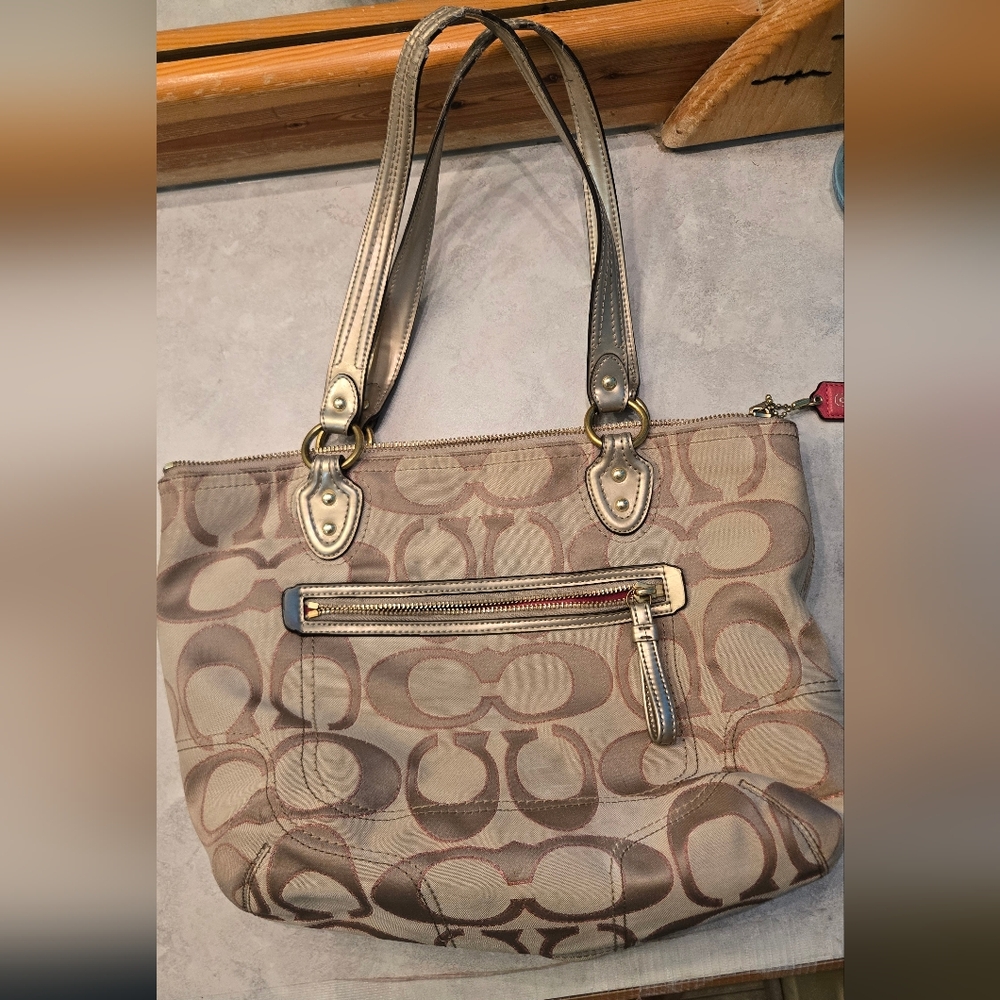 Coach Tan Shoulder Bag with Signature Design. Some Wear On The Straps.
